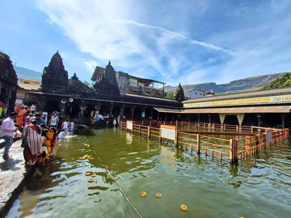 Godavari kund at Trimbakeshwar with temple spires behind